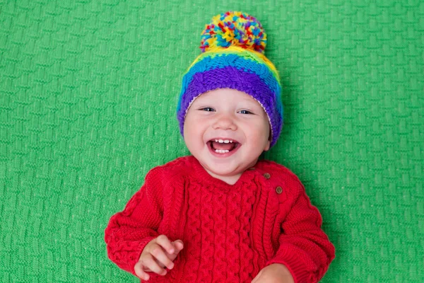 Little baby in warm knitted hat — Stock Photo, Image