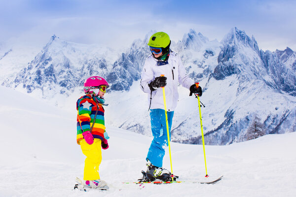 Kids skiing in the mountains