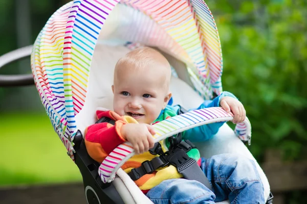 Baby boy in white stroller — Stock Photo, Image