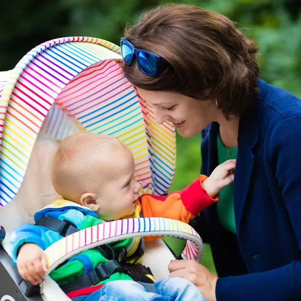 Mom and baby in a stroller — Stock Photo, Image