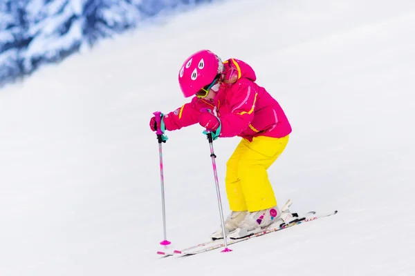 Little girl skiing in the mountains — Stock Photo, Image