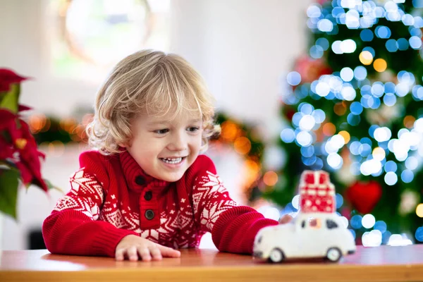 Child Christmas Present Kid Xmas Gift Little Boy Playing Toy — Stock Photo, Image