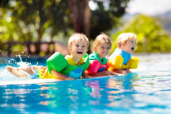 Kids Play Outdoor Swimming Pool Tropical Resort Swim Aid Young — Stock Photo, Image