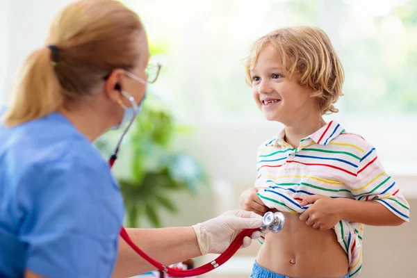 Pediatrician Doctor Examining Sick Child Face Mask Ill Boy Health Stock Picture