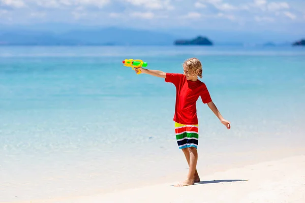 Child Playing Toy Water Gun Vacation Beach Fun Kids Run — Stock Photo, Image