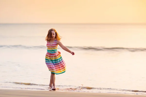 Child Playing Ocean Beach Kid Jumping Waves Sunset Sea Vacation — Stock Photo, Image