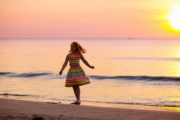 Child Playing Ocean Beach Kid Jumping Waves Sunset Sea Vacation — Stock Photo, Image