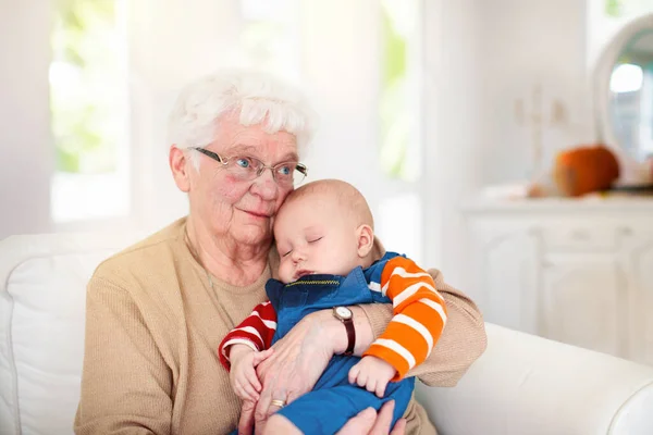 Grandmother Holding Newborn Baby Family Reunion Senior Woman Little Child — Stock Photo, Image