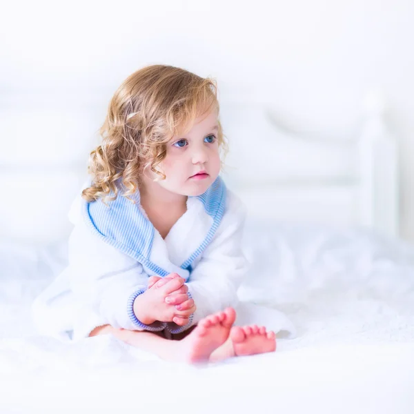 Litlte girl in a bathrobe and towel — Stock Photo, Image