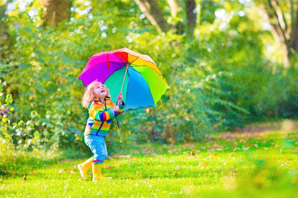 Little girl with umbrella — Stock Photo, Image