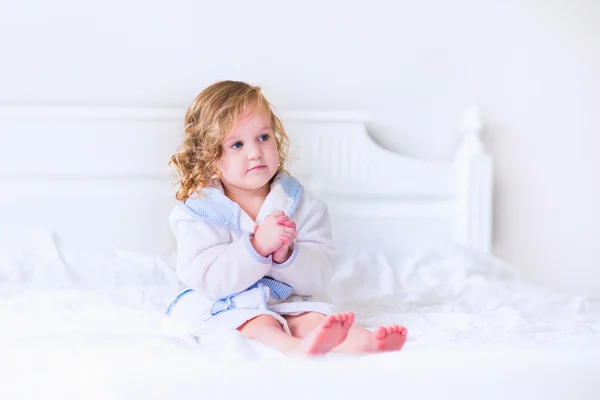 Litlte girl in a bathrobe and towel — Stock Photo, Image