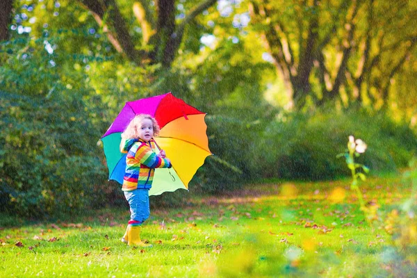 Little girl with umbrella — Stock Photo, Image