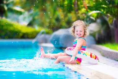 Little girl in a swimming pool clipart