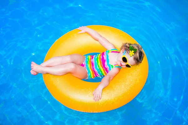 Little girl in a swimming pool