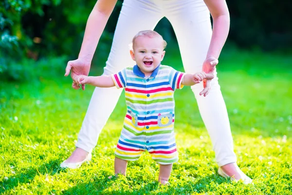 Little baby boy making his first steps — Stock Photo, Image