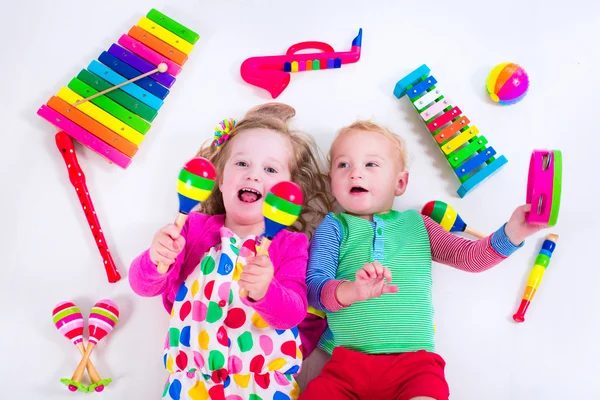 Kids with music instruments.