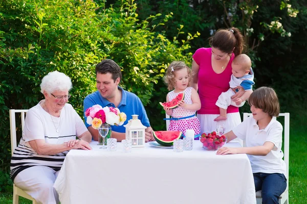 Big family having lunch outdoors — Stock Photo, Image