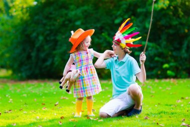 Kids playing in Halloween costumes