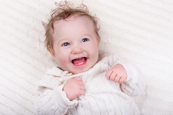 Baby girl on knitted blanket — Stock Photo, Image