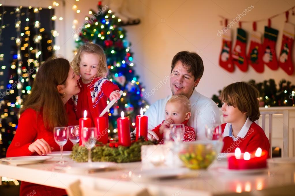 Family With Children At Christmas Dinner At Home Stock Photo Image By C Famveldman 90680162