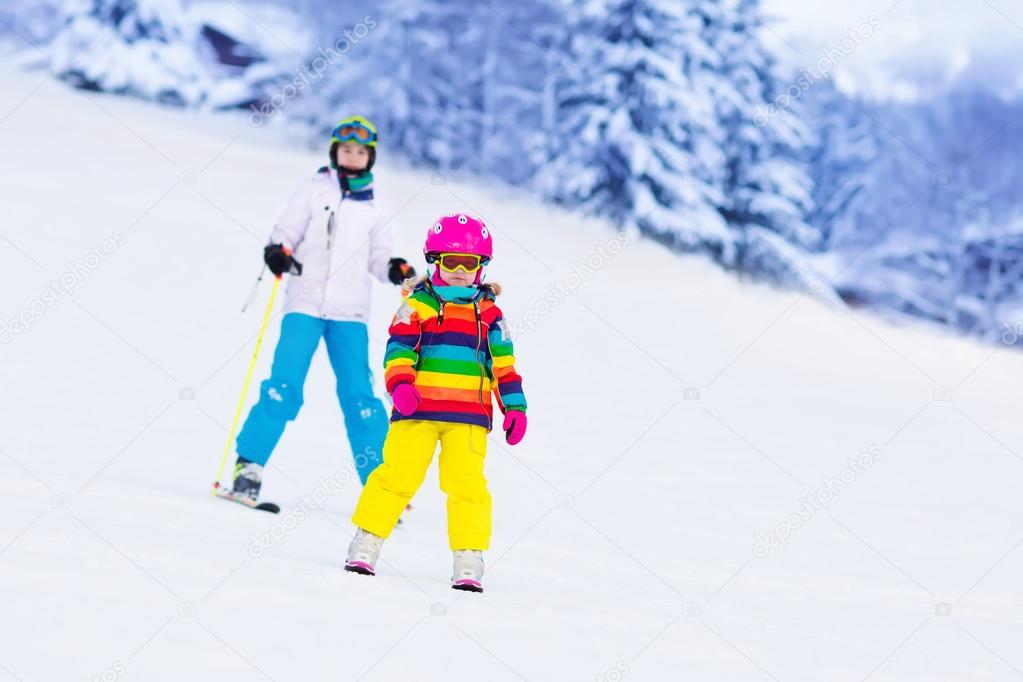 Kids skiing in the mountains