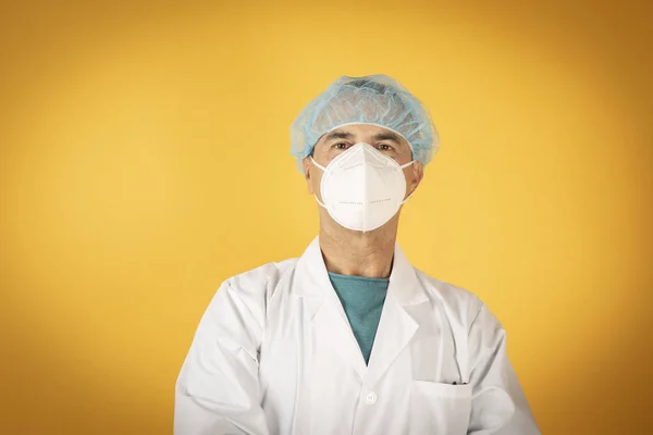 sad surgeon doctor on yellow background