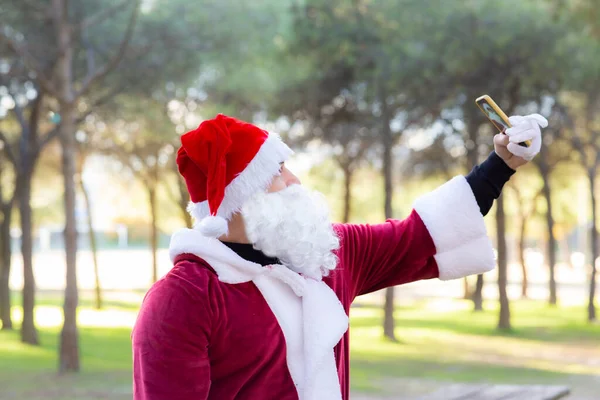 Santa Claus Takes Pictures His Mobile Forest — Stock Photo, Image