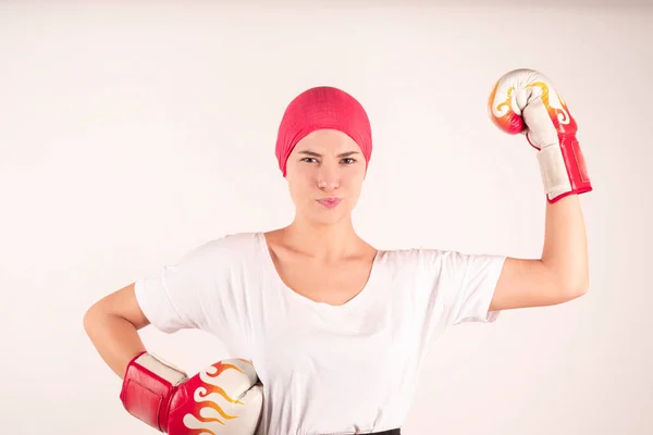 cancer fighter woman with boxing gloves