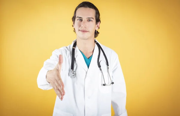 Handsome Man Blue Eyes Happy Doctor Welcomes His Hands Yellow — стоковое фото