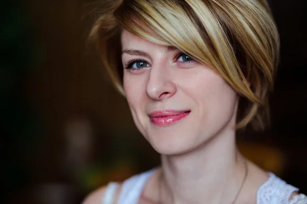 Beauty portrait of a young woman with a slight smile