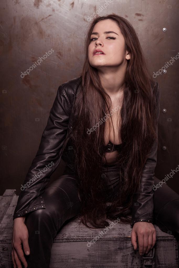 Girl in leather pants and jacket Stock Photo by ©VladimirKrupenkin 64409471