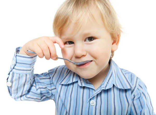 Cute little child eating — Stock Photo, Image