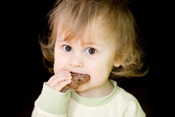 Bebê comer pão — Fotografia de Stock