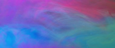 UV parlak renklerin renkli bir karışımında yüzen ışık kabarcıkları yavaş çekimde galaksi etkisi yaratıyor