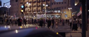 Jerusalem, Israel - August 29, 2020: People walking towards the square in central Jerusalem, to protest against the current government in israel.