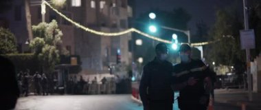 Jerusalem, Israel - August 29, 2020: Policemen in face masks guarding the mass protests in Jerusalem.