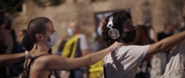 Jerusalem, Israel - August 29, 2020: People in face masks protesting against the political situation in Israel