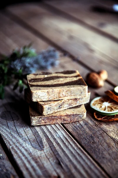 Natural cosmetics. Organic scrub soap on wooden background. Puri — Stock Photo, Image