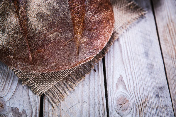 Food. bread on a wooden background — Stock Photo, Image