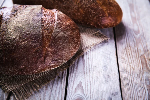 Food. bread on a wooden background — Stock Photo, Image