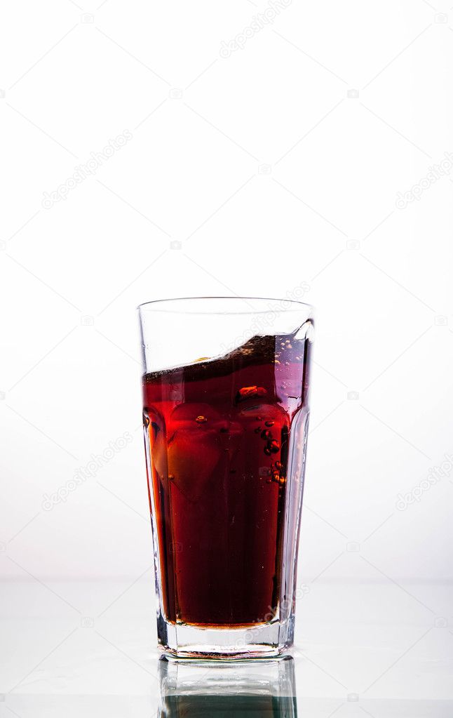 soft drinks. Cola glass on a white background
