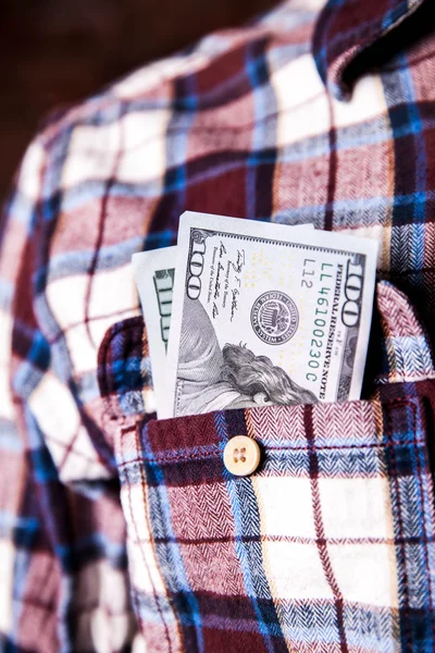 Cien dólares americanos en el bolsillo de la camisa —  Fotos de Stock