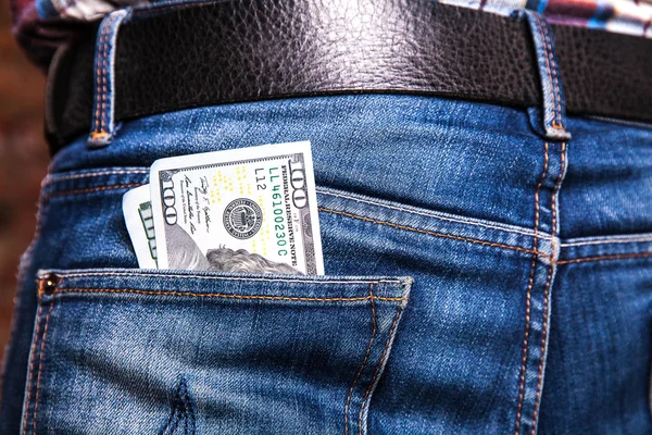 Dólares en un bolsillo vaquero, primer plano —  Fotos de Stock