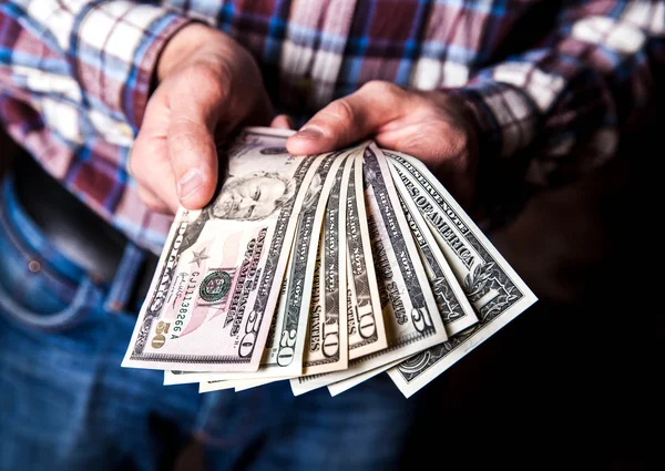 Dollars in the hands — Stock Photo, Image