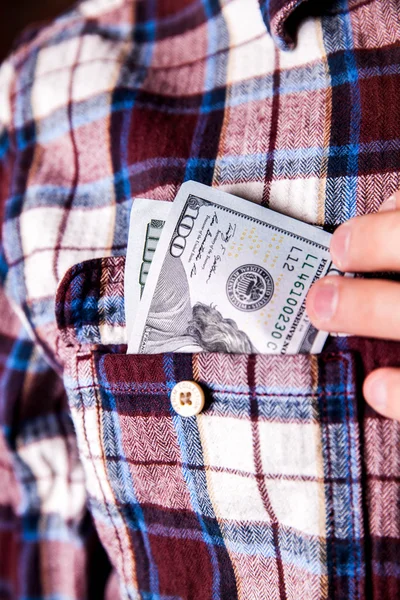 Cien dólares americanos en el bolsillo de la camisa — Foto de Stock