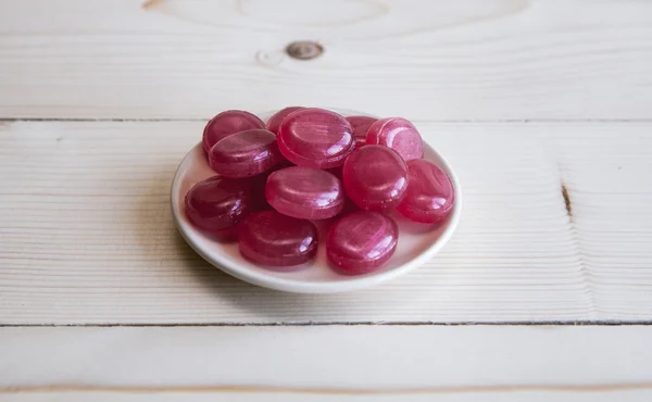 Bonbons auf Holz, Valentinstag Hintergrund — Stockfoto