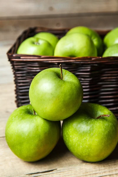 Fruit. apples in a basket on wooden table — Stock Photo, Image