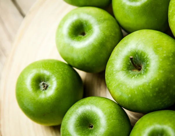 Fruit. apples in a bowl on wooden background — Stock Photo, Image