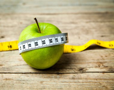 fruit. Apple and centimeter. Healthy eating