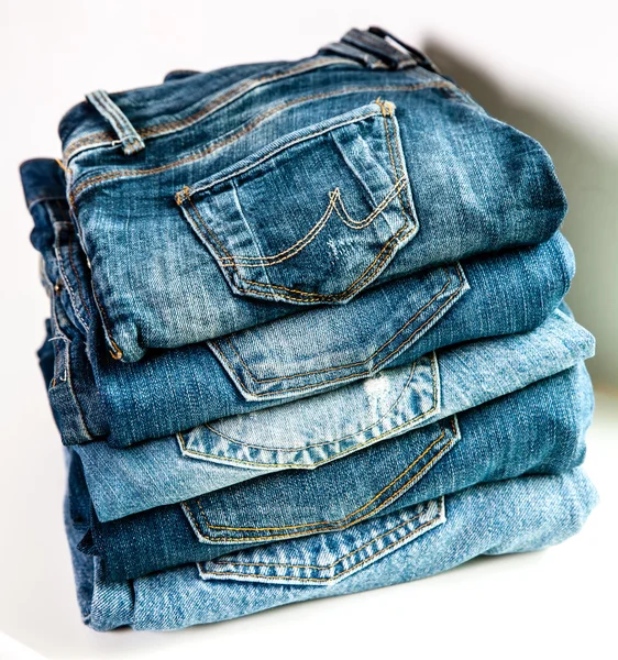 Lot of different blue jeans Blue Jeans. clothes — Stock Photo, Image